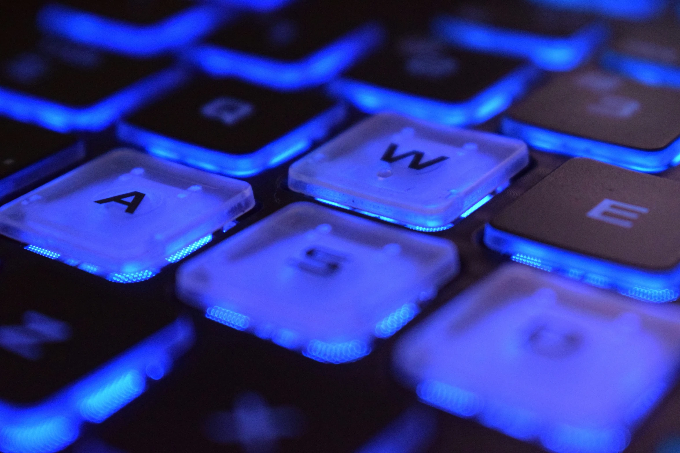 a closeup view of a computer keyboard with letters