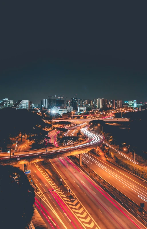 night scene of various traffic lights in a city