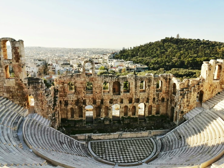 a large auditorium sitting on top of a hill