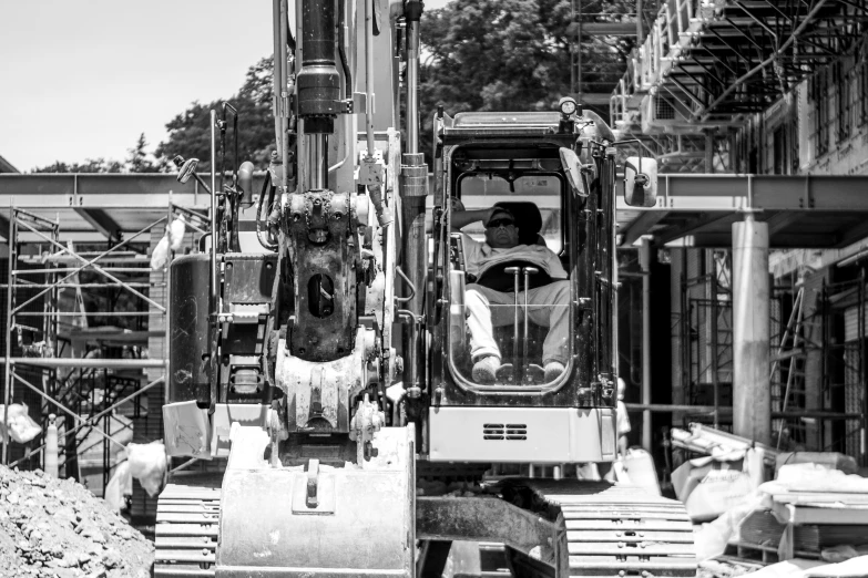 an old po of a person inside a forklift