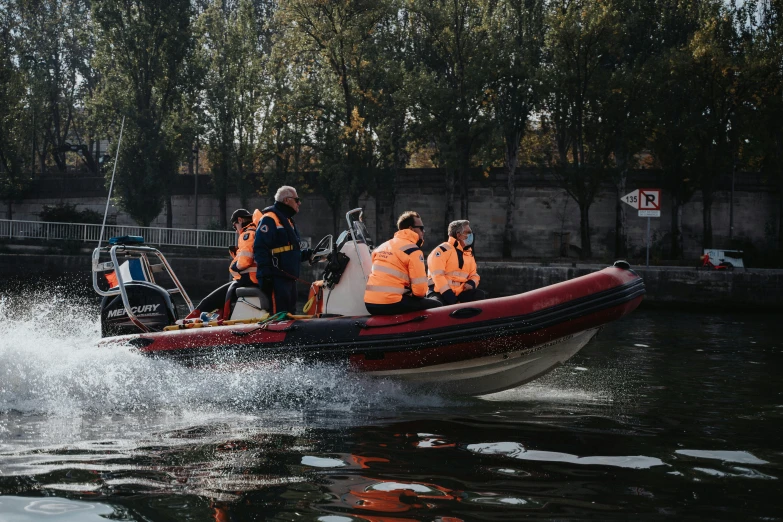 a boat with four men on it