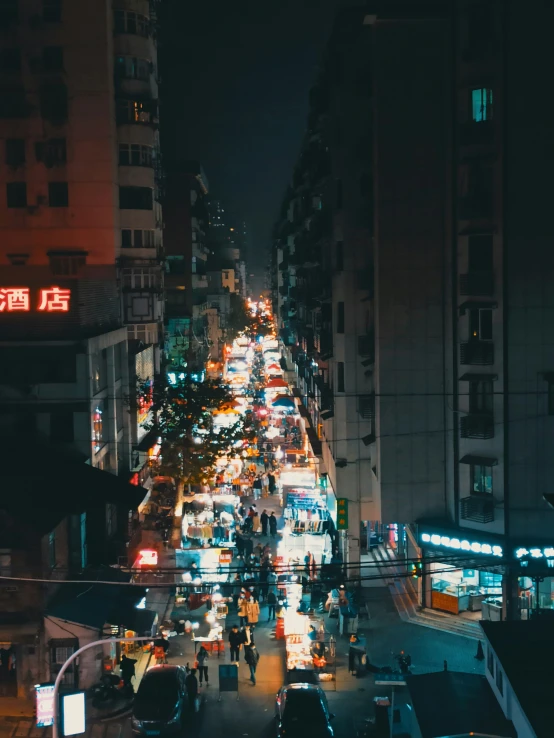 the nighttime city traffic is lit by the lights