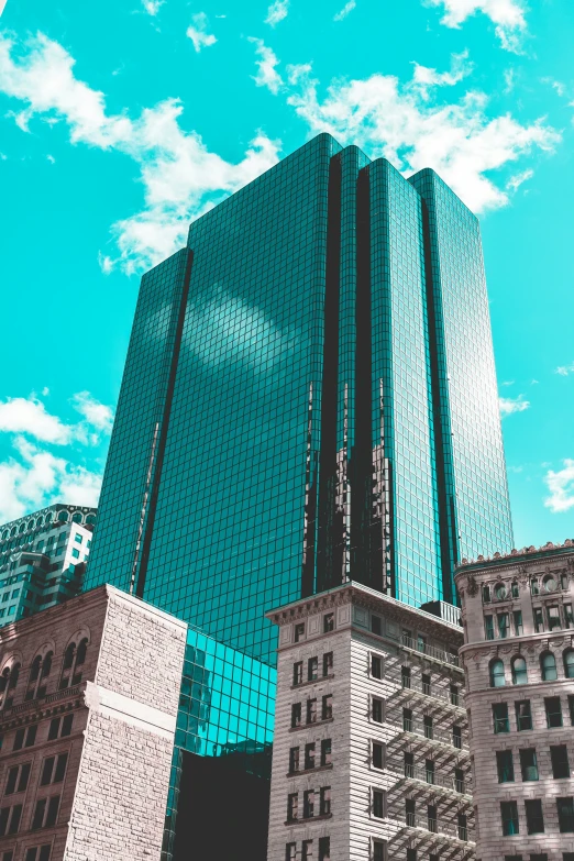 a big building with some buildings in the background