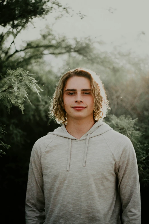 a close up of a person wearing a hoodie