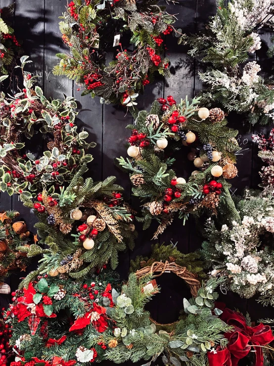 two wreaths are arranged to look like christmas wreaths