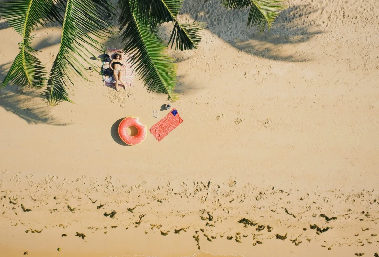 a po taken from the top down of a pink paddle and float