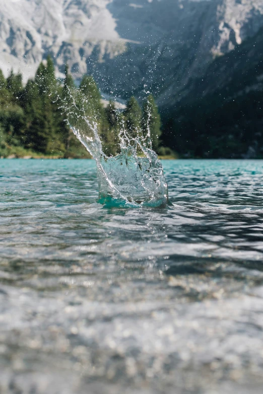 a splash of water that is falling into the river