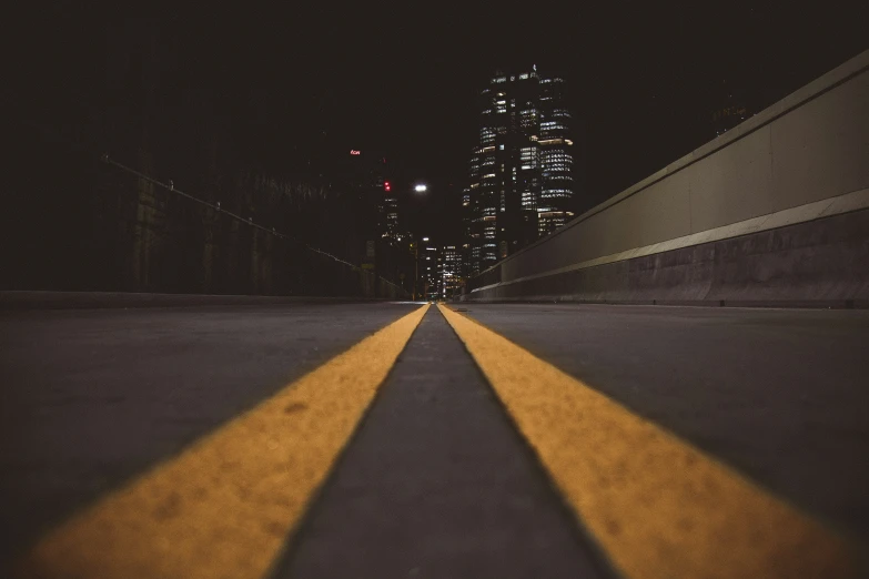 street that has two yellow lines on the road