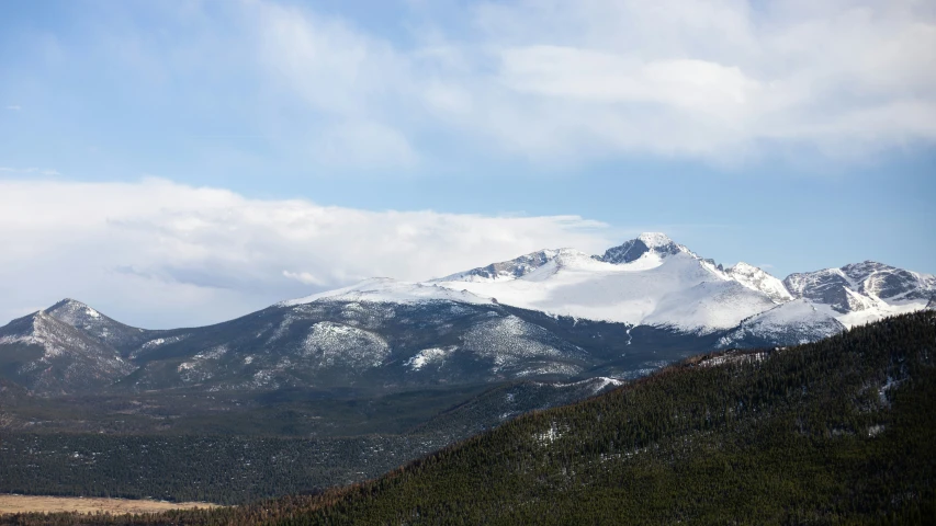 a picture of some mountains with snow on them