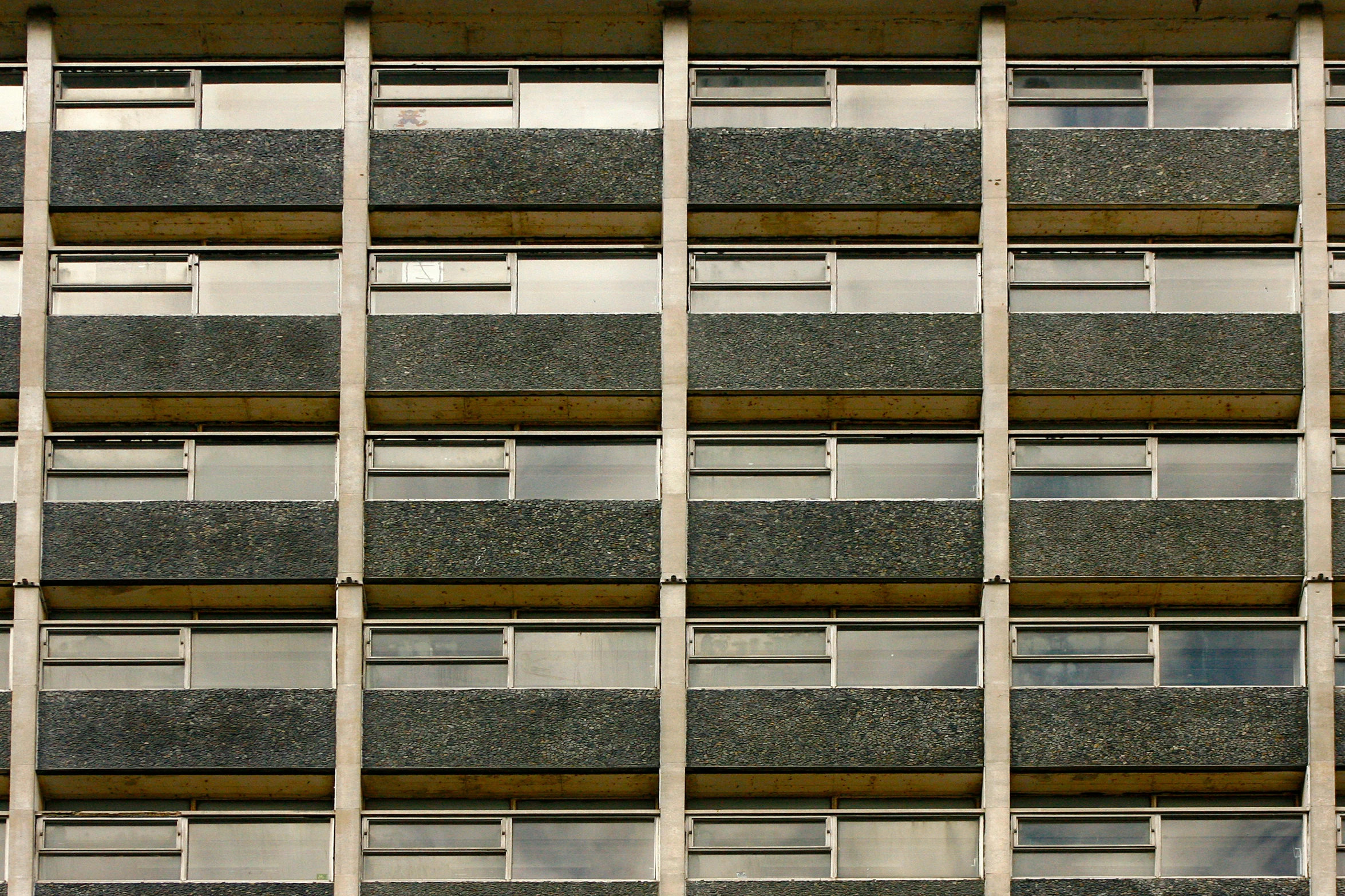 a close up view of a building with several windows