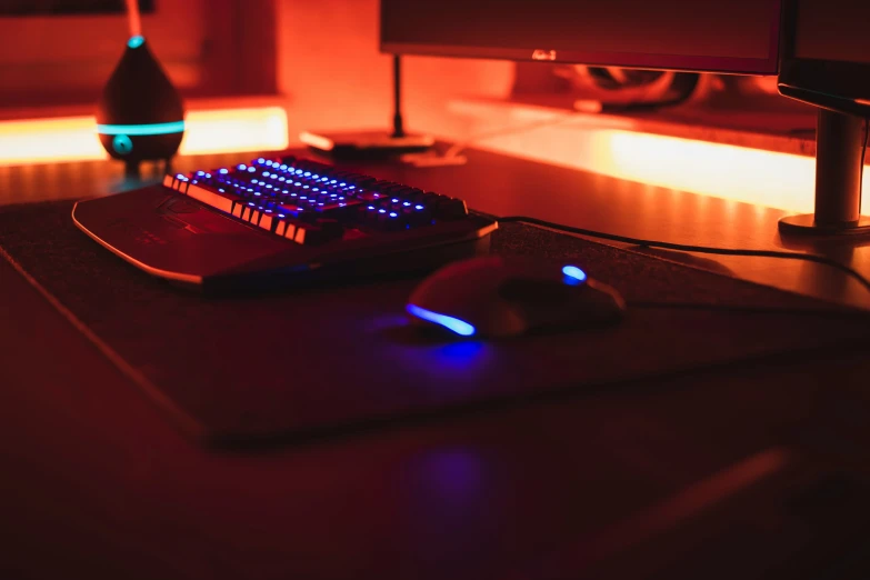 a close up of a keyboard on top of a desk