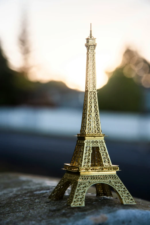 a small plastic model of the eiffel tower in paris