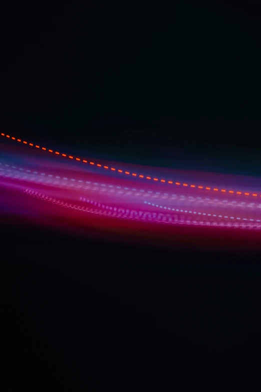 a purple and red abstract pattern with light