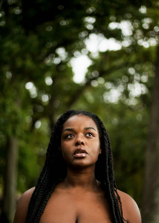 woman posing  with a lot of natural makeup