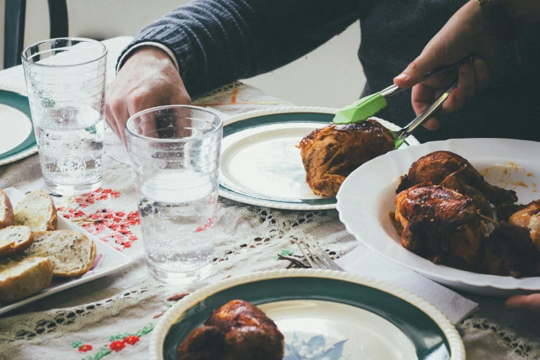 two plates of food being fed on the table