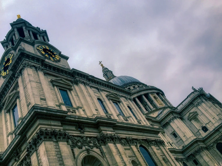 large building with a clock on the top of it