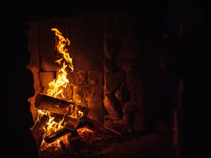 bright, blazing flames shine in the fireplace