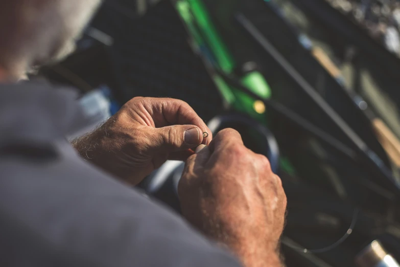 a man is making soing with his finger