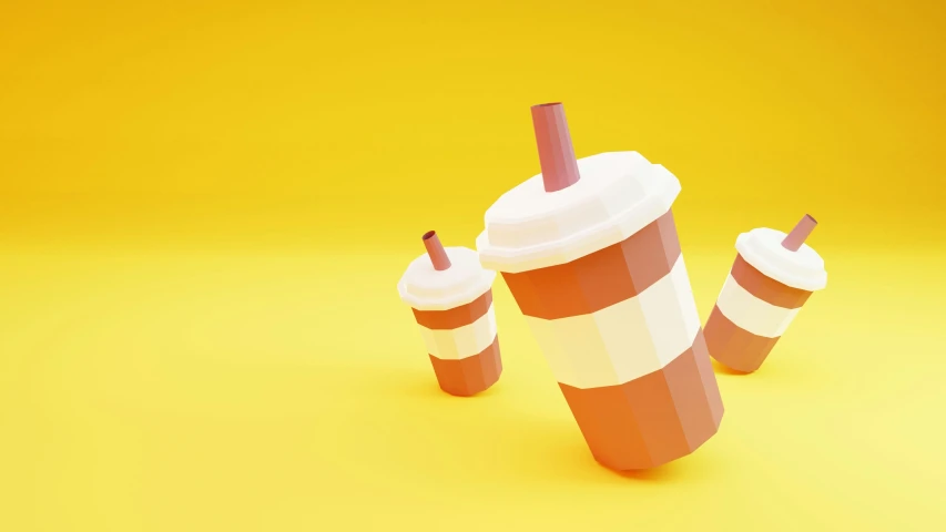 three cups are placed on a yellow background