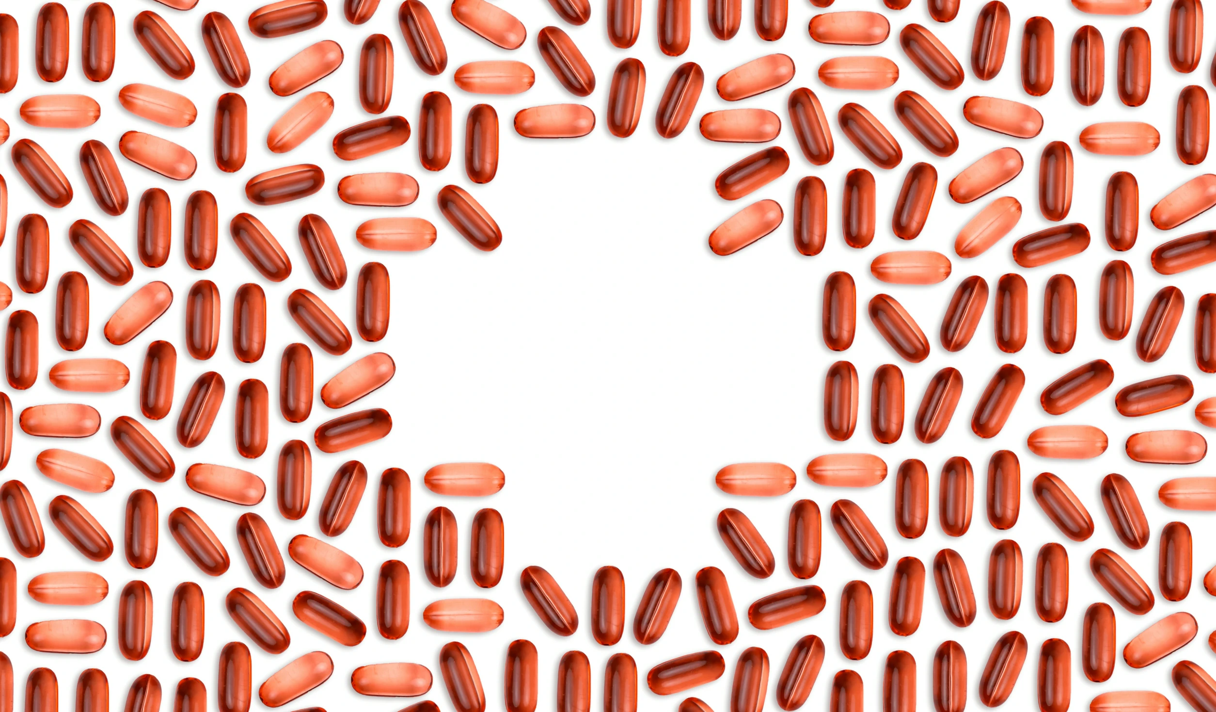 a large group of pills arranged in the shape of a house