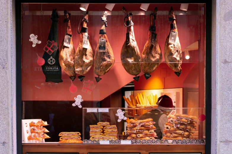 a display case inside of a store filled with food