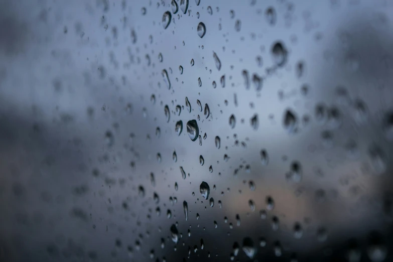 a wet window with rain on it