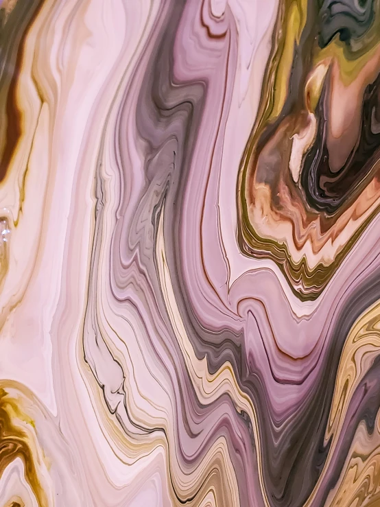 a marble wallpaper with various colors of purple