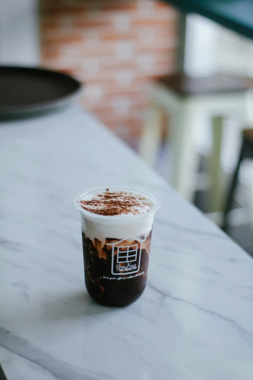 an iced cup with chocolate ding in it