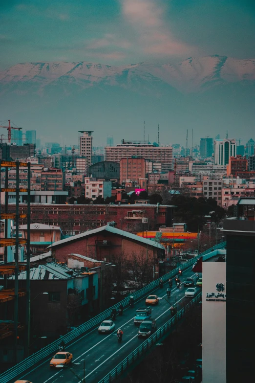 the city skyline is seen from the top of a tall building