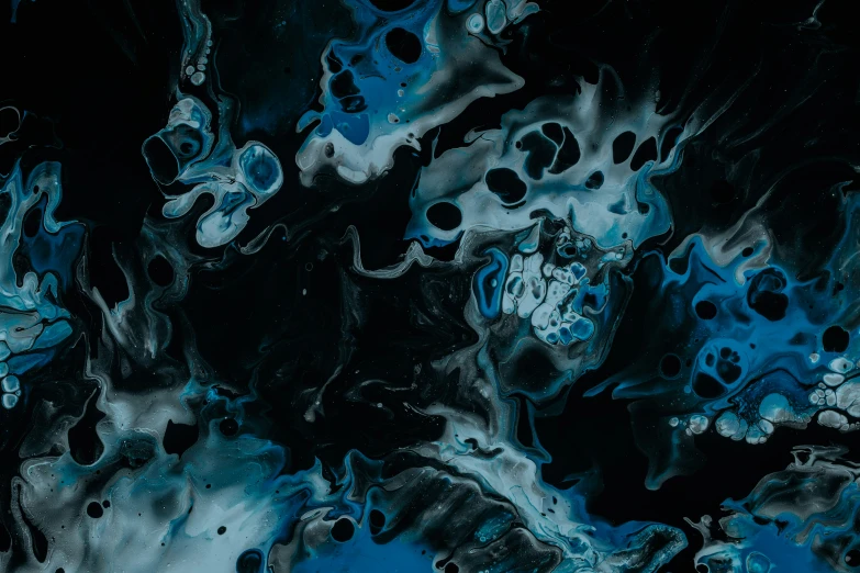 black and blue abstract fluid painting with drops of oil