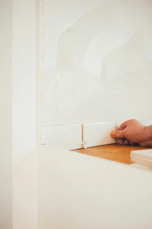 a person  paper on top of a table