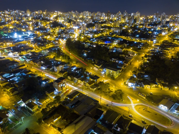 an aerial view of a city at night