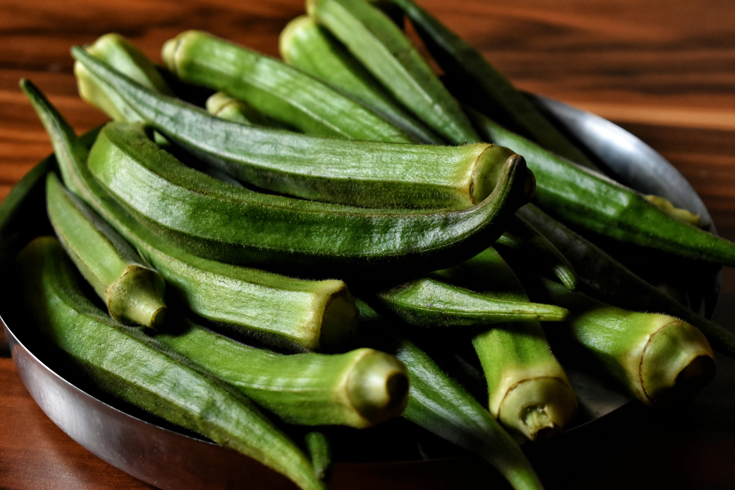 the green beans in a bowl are ready to be cooked