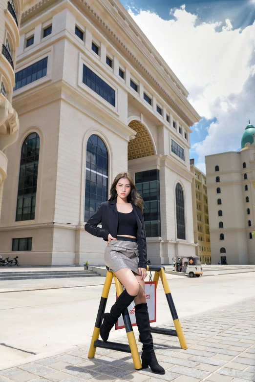 a woman is standing on some kind of ladder