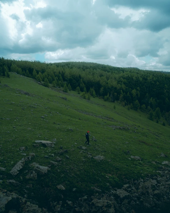 the two people in the green grassy field