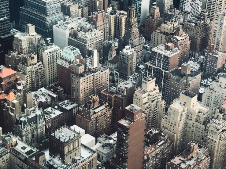 an aerial view of the skyscrs of manhattan