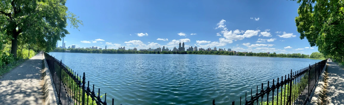 this is an image of a park next to the water