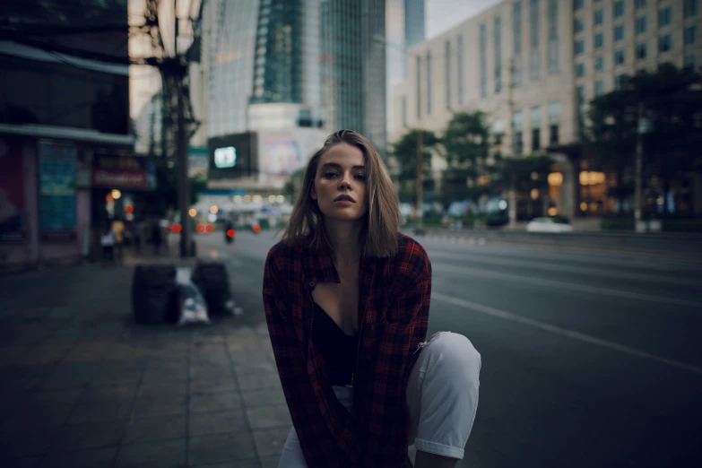 an image of a woman in front of a building