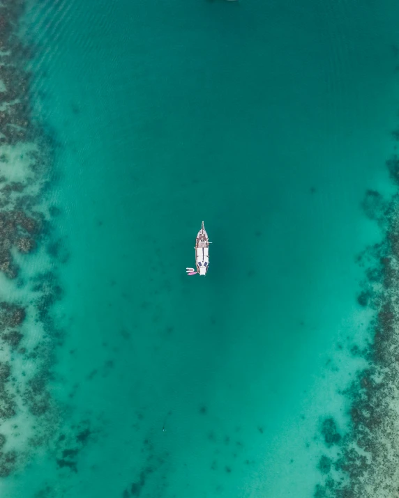 small boat in a large body of water