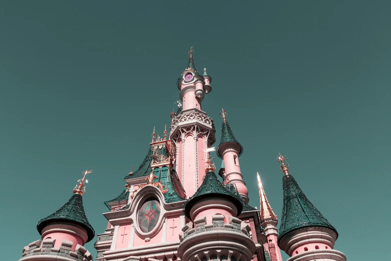 an old castle has clocks on the towers