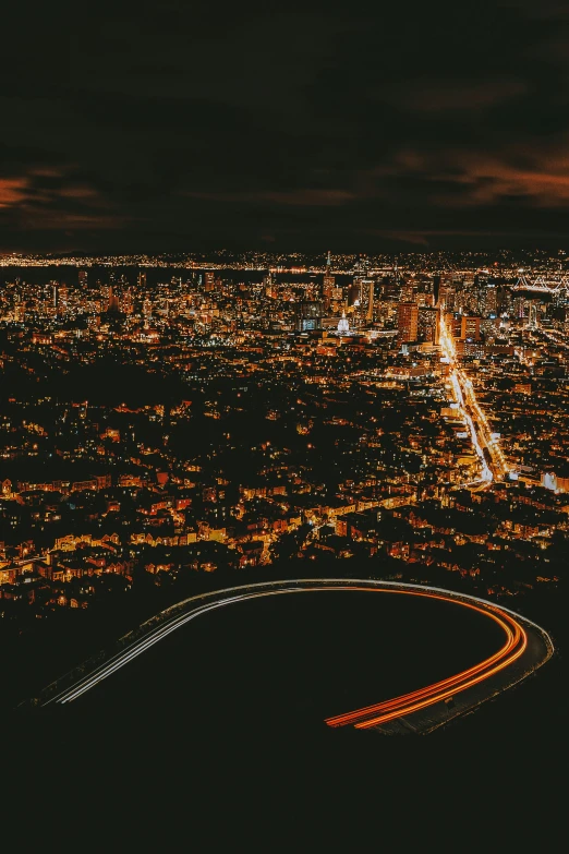 aerial view of a freeway at night with lights