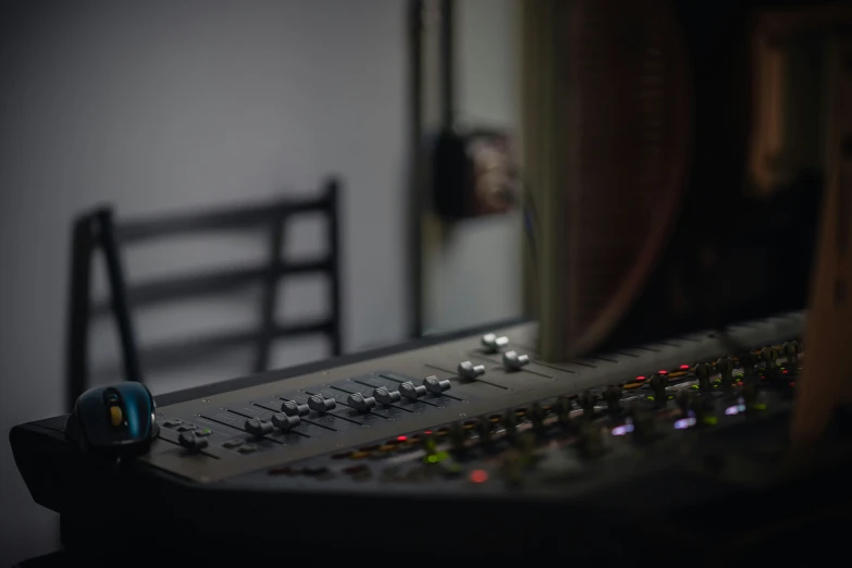 a sound mixing console at a concert venue