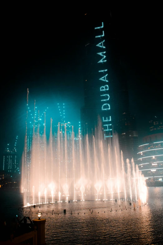 large water fountains in front of a large building