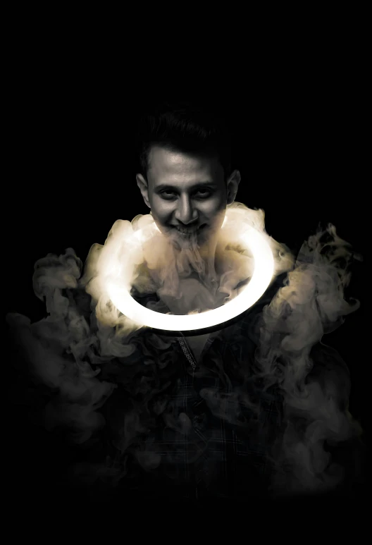 a man with a ring around his neck in smoke