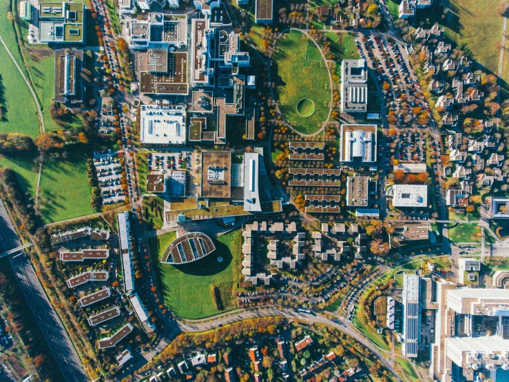 aerial view of building district and surrounding city