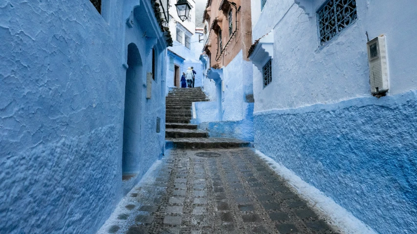 an alley that has been completely blue in color