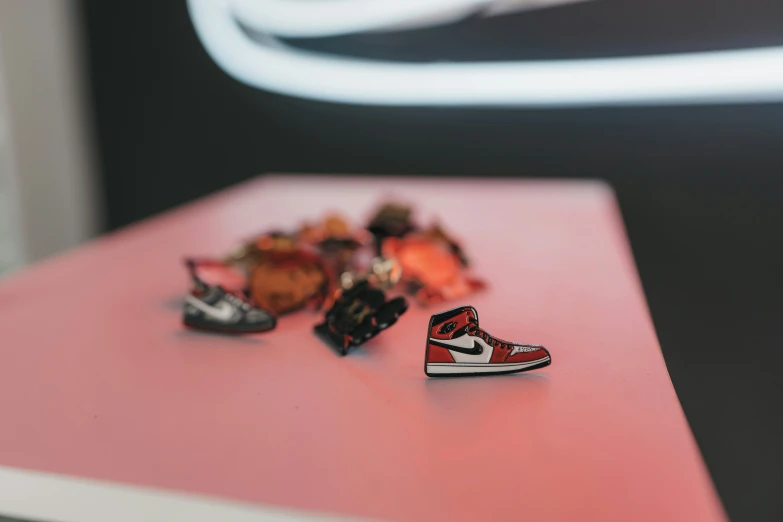 a pair of shoes is laying on top of a table