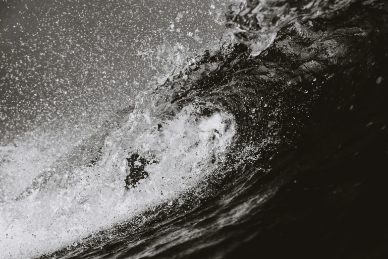 a person riding a surf board on a wave