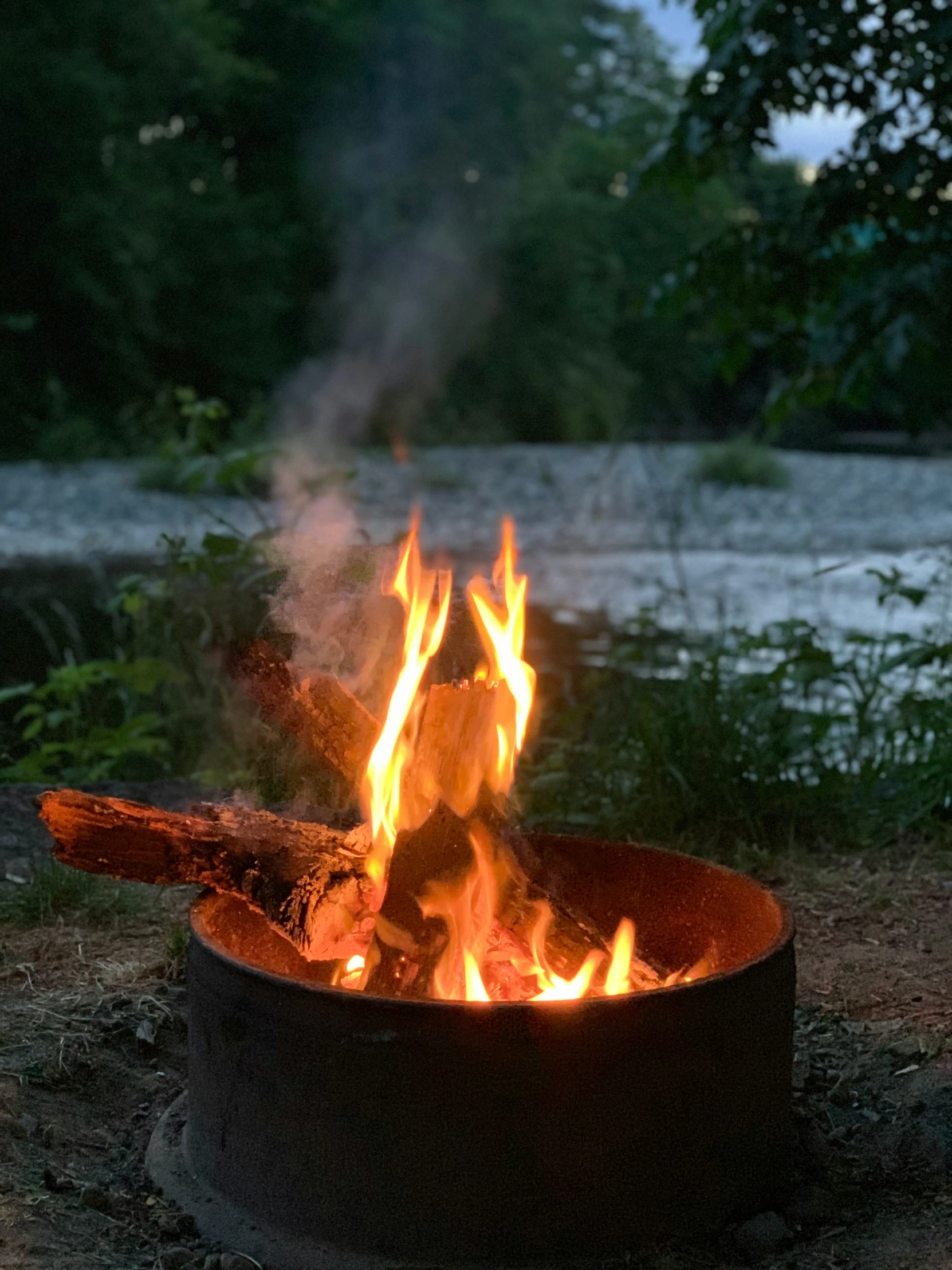 a fire is glowing in a fire pit