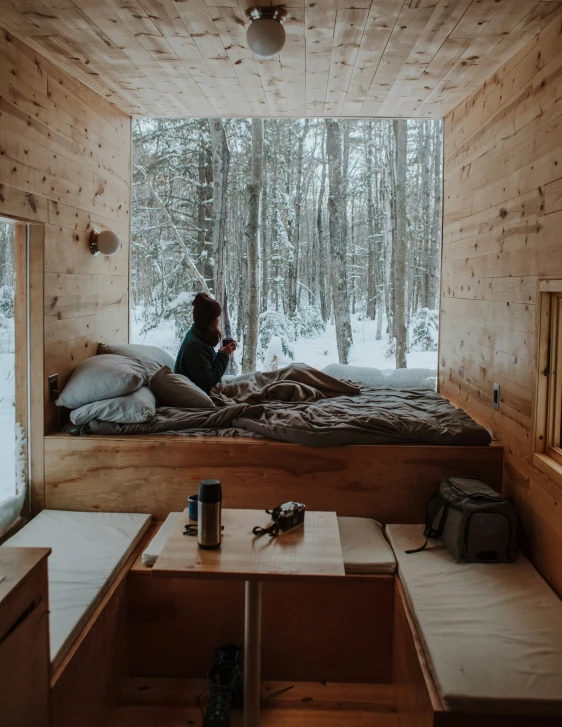 a person in the cabin looking out a window